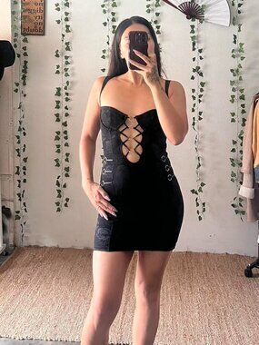 Black floral bodycon mini dress with lace up and silver ring details